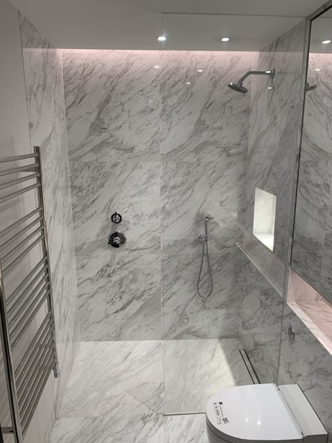 Contemporary bathroom renovation with large-format tiles, Essex