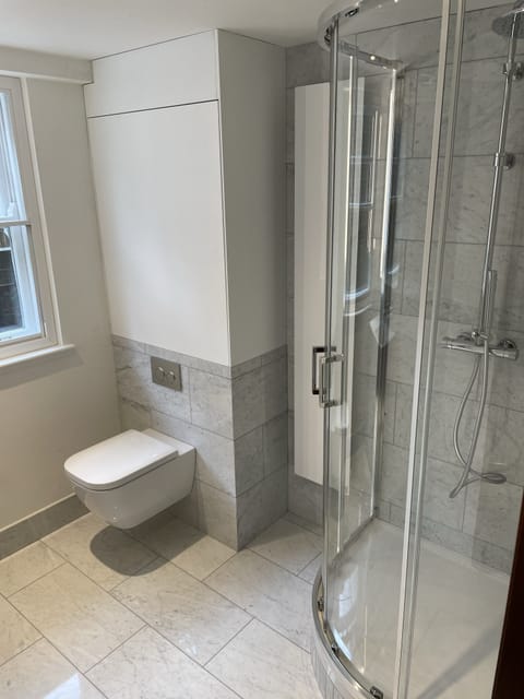 Spa-style bathroom with rainfall shower, Hertfordshire