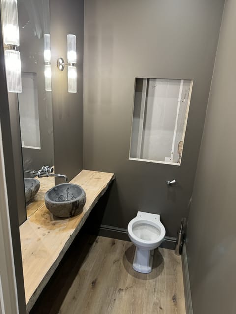 Bathroom suite installation with wall-hung WC, London