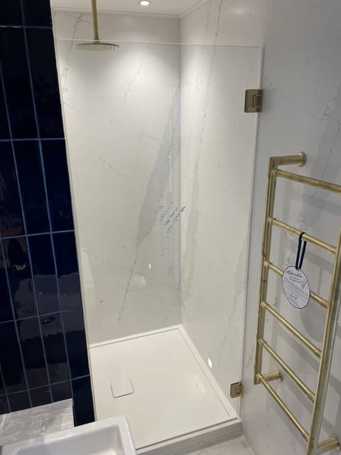 Walk-in shower enclosure with frameless glass, London