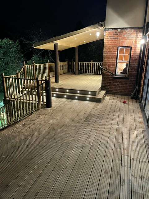 Composite decking installation with steps, East London