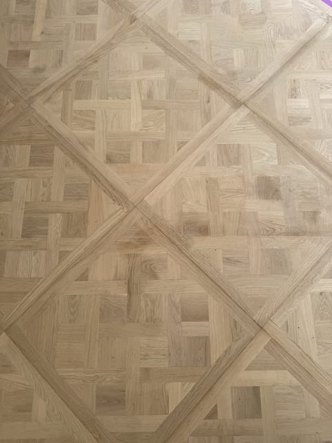Engineered oak herringbone flooring by Crafted Spaces Ltd, London