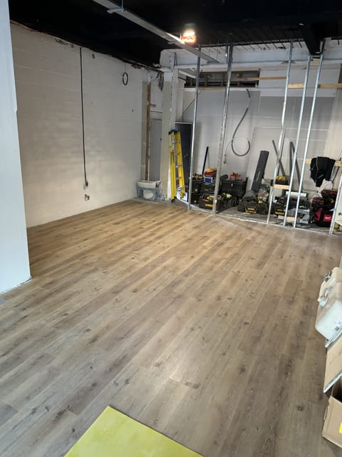 Engineered walnut flooring in dining room, Enfield