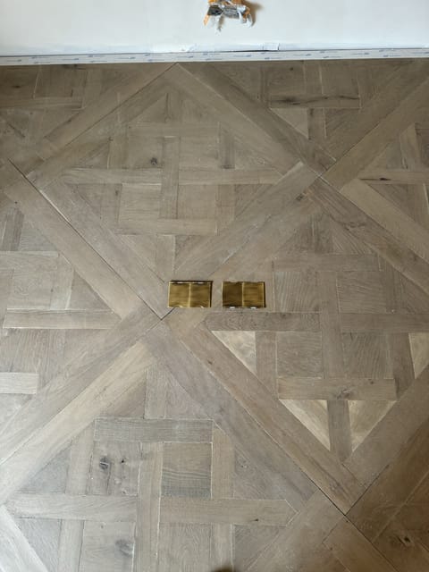 Natural stone effect vinyl flooring by Crafted Spaces Ltd, London
