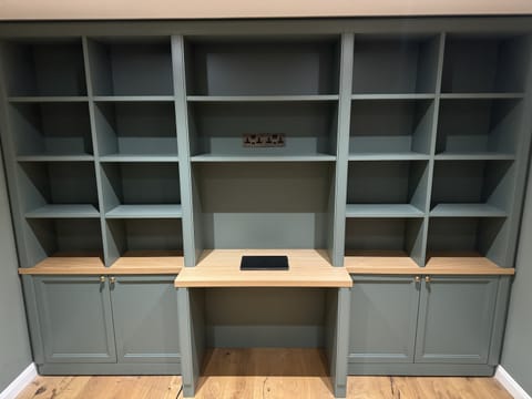 Bespoke fitted wardrobe with sliding doors by Crafted Spaces Ltd
