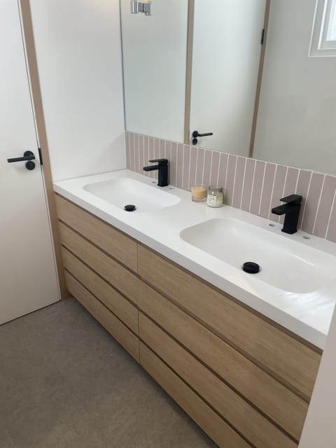 Bespoke media wall with integrated storage, London