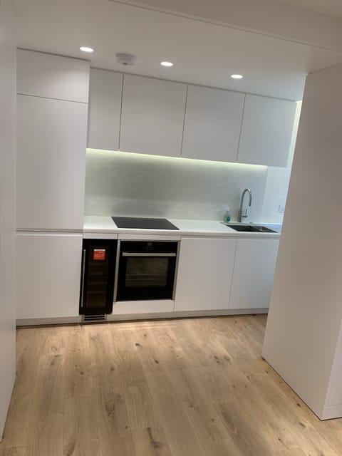 Bespoke kitchen with integrated appliances by Crafted Spaces Ltd, Essex