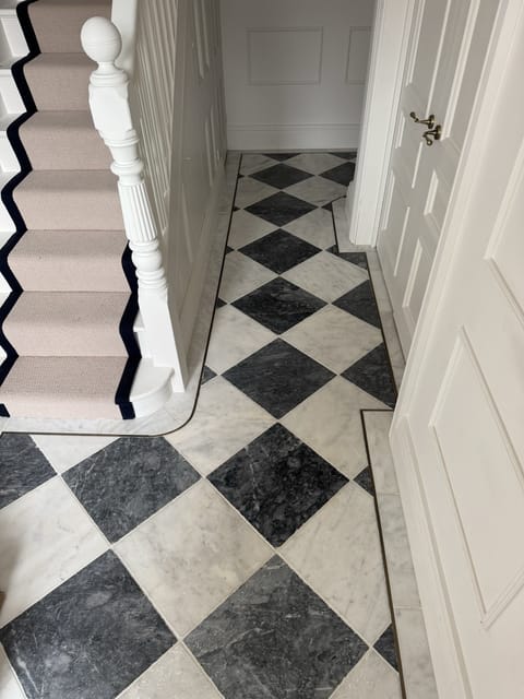 Large-format porcelain floor tiles by Crafted Spaces Ltd, London