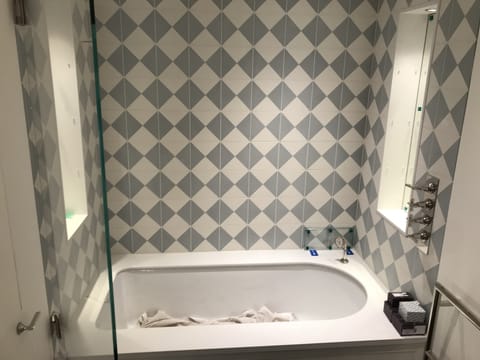 Large-format shower tiling by Crafted Spaces Ltd, Hertfordshire