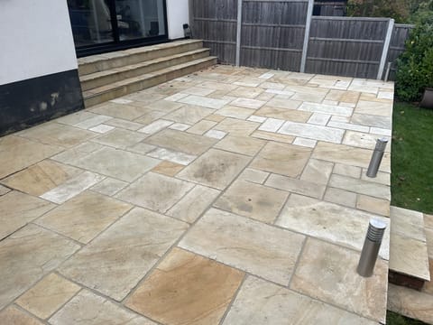 Contemporary floor and wall tiling in new-build bathroom, London